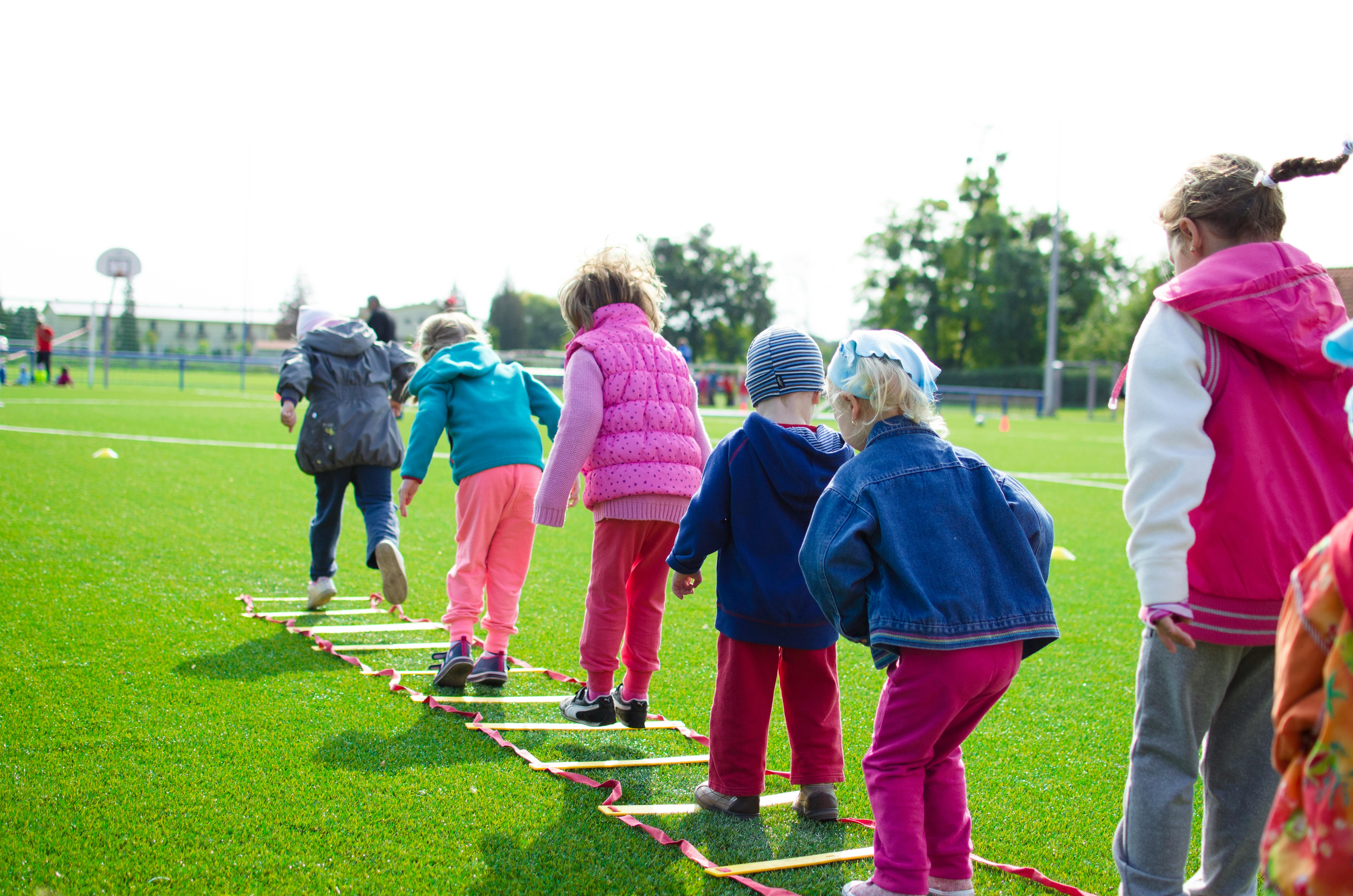 Child practising hopping during a movement session